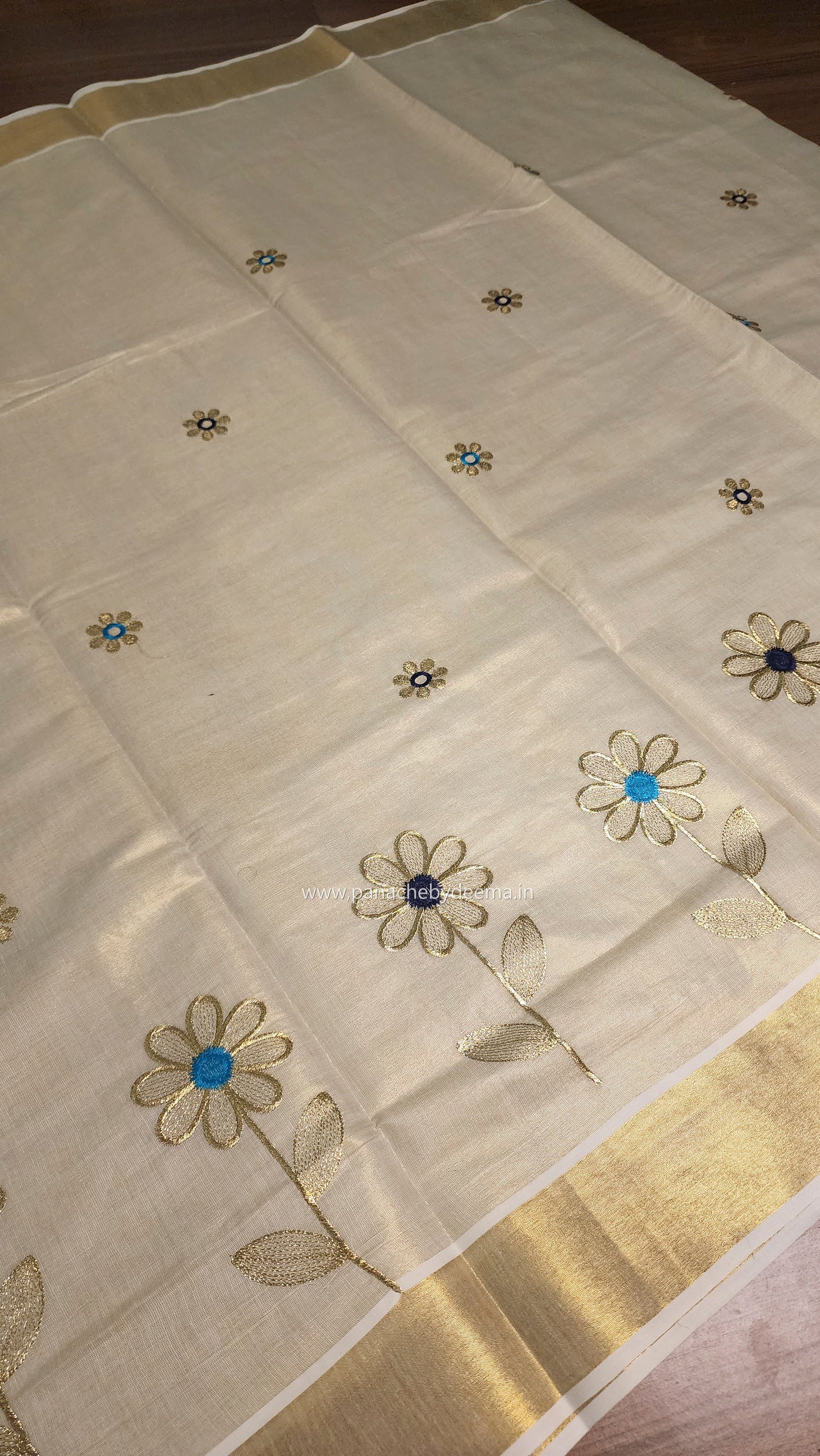 Golden tissue kerala saree with flower embroidery | Navy blue and seablue ON102