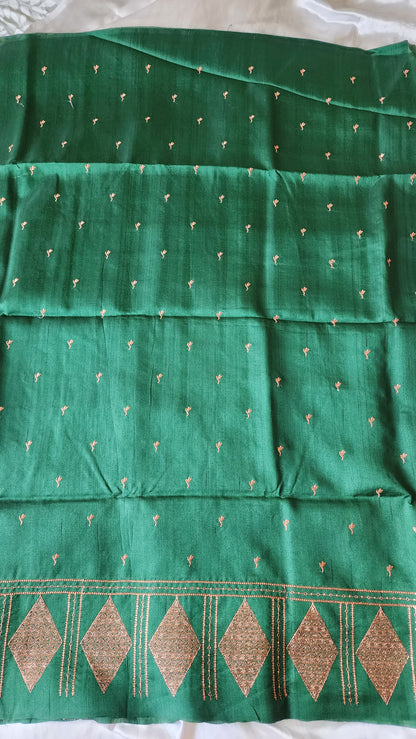 Look festive ready in this premium semi raw silk designer saree with beautiful copper zari embroidery | Bottle Green | P17