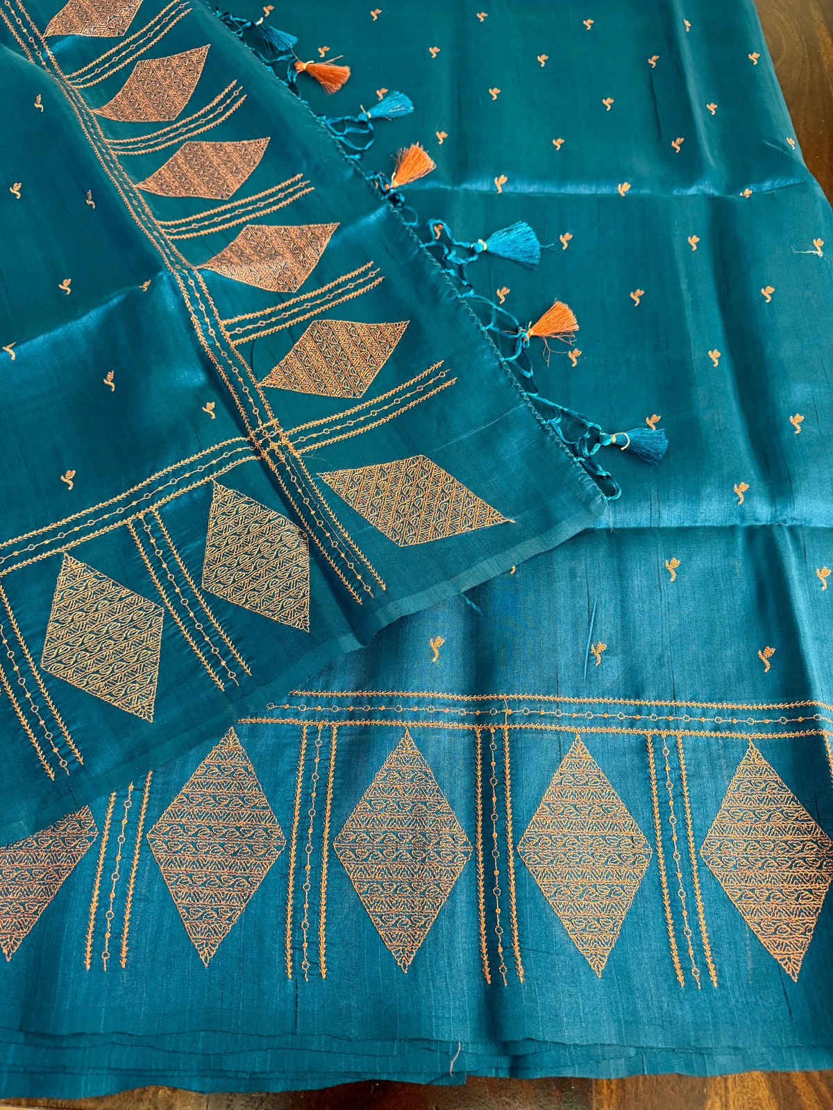Look festive ready in this premium semi raw silk designer saree with beautiful copper zari embroidery | Teal blue | P15