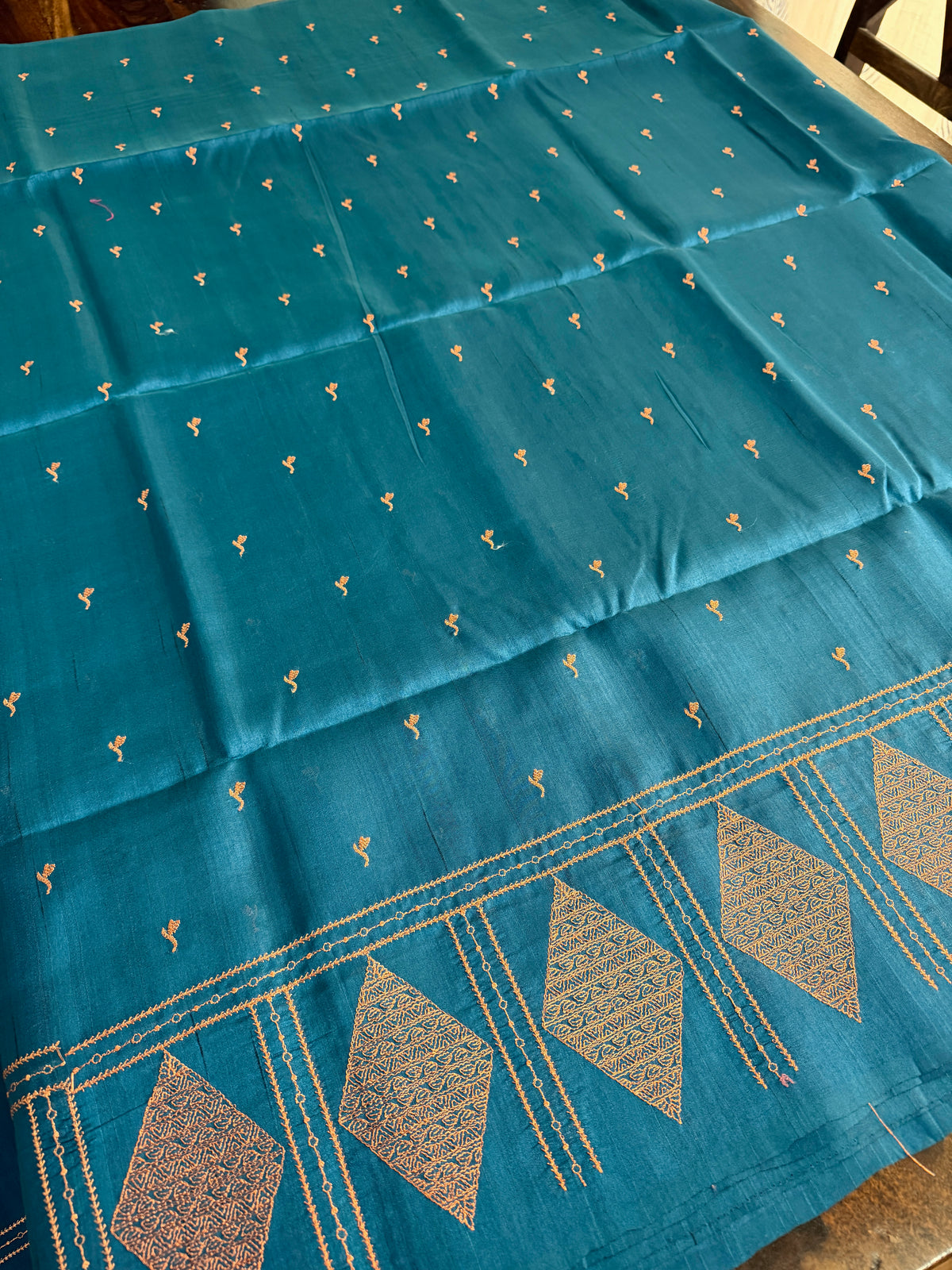 Look festive ready in this premium semi raw silk designer saree with beautiful copper zari embroidery | Teal blue | P15