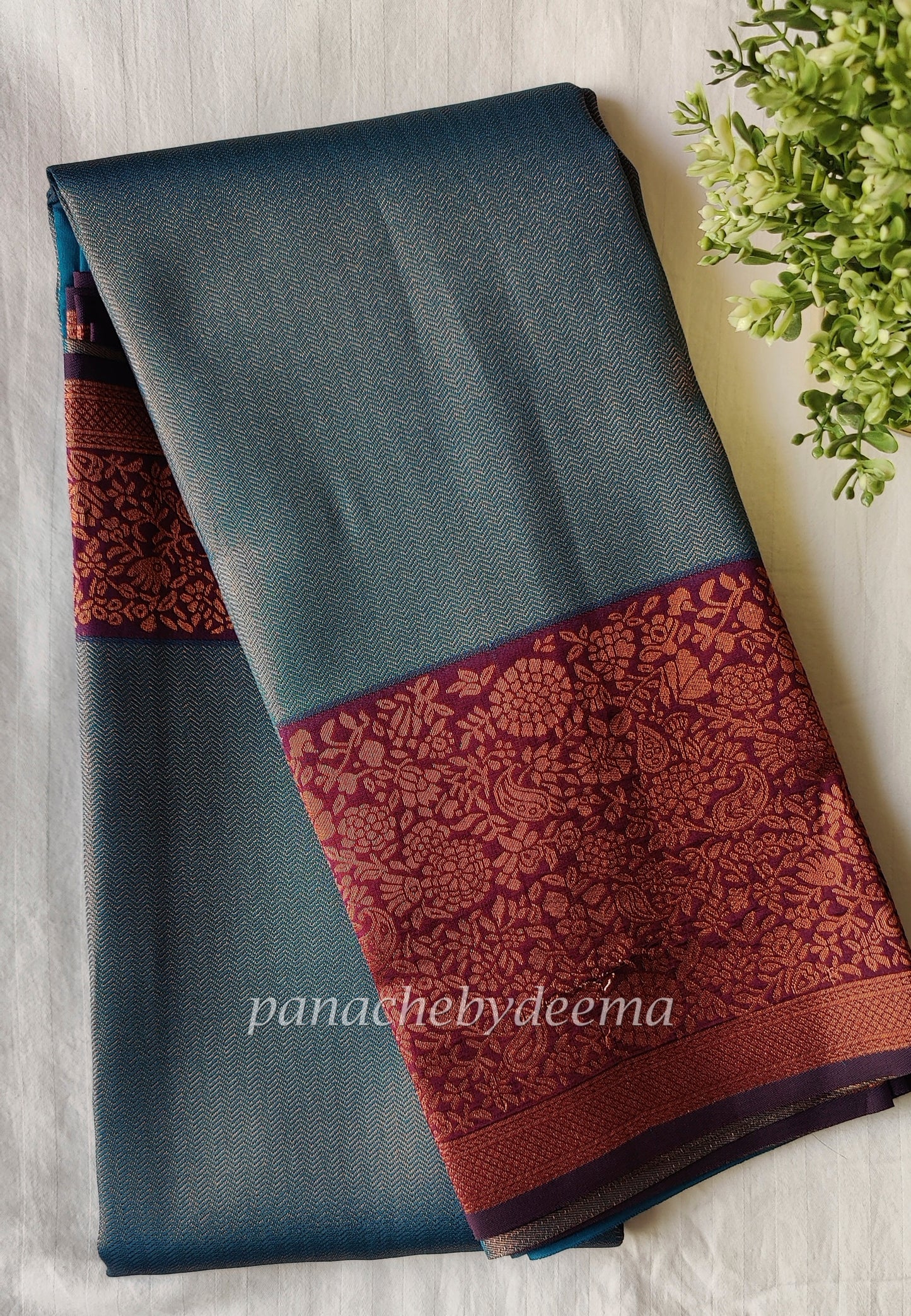 Peacock blue with maroon border